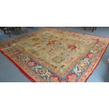 A large hand-knotted Ushak style carpet (possibly Donegal, Arts & Crafts); the light lime-green