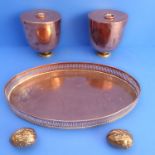 An early 20th century oval copper tray with pierced gallery, together with a pair of copper and