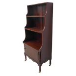 A good early 20th century mahogany, crossbanded and rosewood-fronted waterfall-style bookcase: three