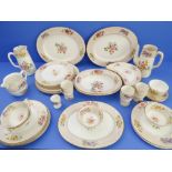 An early 20th century Cauldon China part tea service (pattern 4645) decorated with floral sprays and