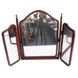 A mahogany triple dressing table mirror with arched top (64cm high)
