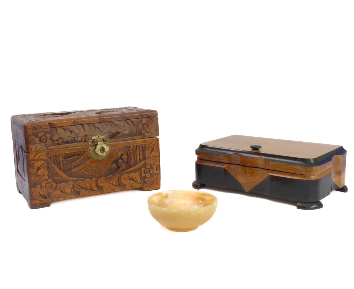 A Chinese casket with carved exterior, an Art Deco musical cigar box and a turned alabaster bowl (
