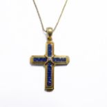 A 18-carat gold, sapphire and diamond cross with an 18-carat gold chain