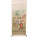 A Chinese scroll watercolour depicting two courtesans within a garden, signed and with circular