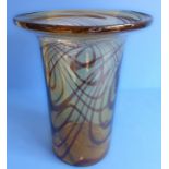 An unusual 19th century glass vase: amber coloured body with metallic brown style swirling, looped