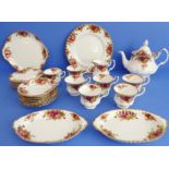 A Royal Albert 'Old Country Roses' bone china tea service comprising: a large teapot (20 cm high);