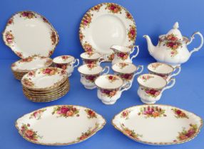 A Royal Albert 'Old Country Roses' bone china tea service comprising: a large teapot (20 cm high);
