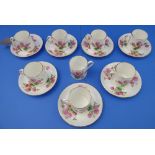 A set of seven Hammersley & Co. bone china coffee cans and saucers (retailed by T Goode & Co Ltd),