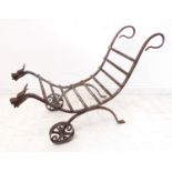 An unusual blacksmith-made wrought-iron garden stand of cradle form. Two looping handles above