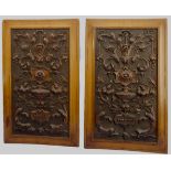 A pair of early 20th century satin walnut panels: each intricately carved with scrolling foliage and