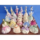 Twenty-five mostly Coalport porcelain figures to include 'Fuchsia', 'Poppy', 'Lady Frances', 'Lady