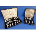 A cased set of twelve early 20th century hallmarked silver teaspoons, together with a pair of