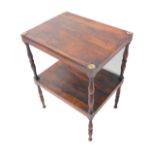 An early 19th century rosewood occasional table; two tiers and on turned legs (50cm wide x 38.5cm