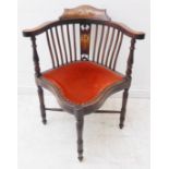 A late 19th to early 20th century mahogany, strung and marquetry corner chair: the top rail