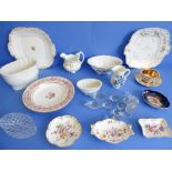 A selection of varied ceramics to include: two jelly moulds; seven mainly cut-glass decanter