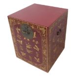 A modern red lacquer and gilded oriental chest with carrying handles (probably Chinese) (45cm square
