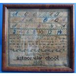 A mid 19th century framed and glazed (later) needlework sampler by Elizabeth Ritchie (Eastnor
