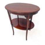 An Edwardian period oval mahogany and satinwood crossbanded occasional table: raised on square