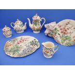 A Gien 'Tamarin' 18-piece tea and coffee service: teapot and coffee pot; milk jug and sugar; 13 x 23