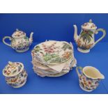 A Gien 'Tamarin' 17-piece tea and coffee service: teapot and coffee pot; milk jug and sugar; 13 x 23