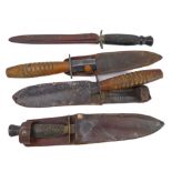 Four commando-style daggers: 2 similar with chequered ebonised handles and their ricassos marked '