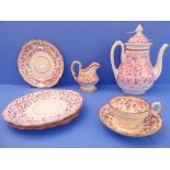 19th century Sunderland lustreware comprising a coffee pot (26 cm high) and a cream jug, a cup and