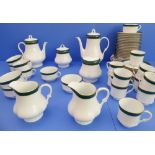 A Thomas Goode 'Emerald' 25-piece tea and coffee service: teapot and coffee pot; two milk jugs and