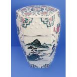 A hexagonal Chinese ceramic garden seat decorated with flowers and lanterns (32cm wide x 48cm high)