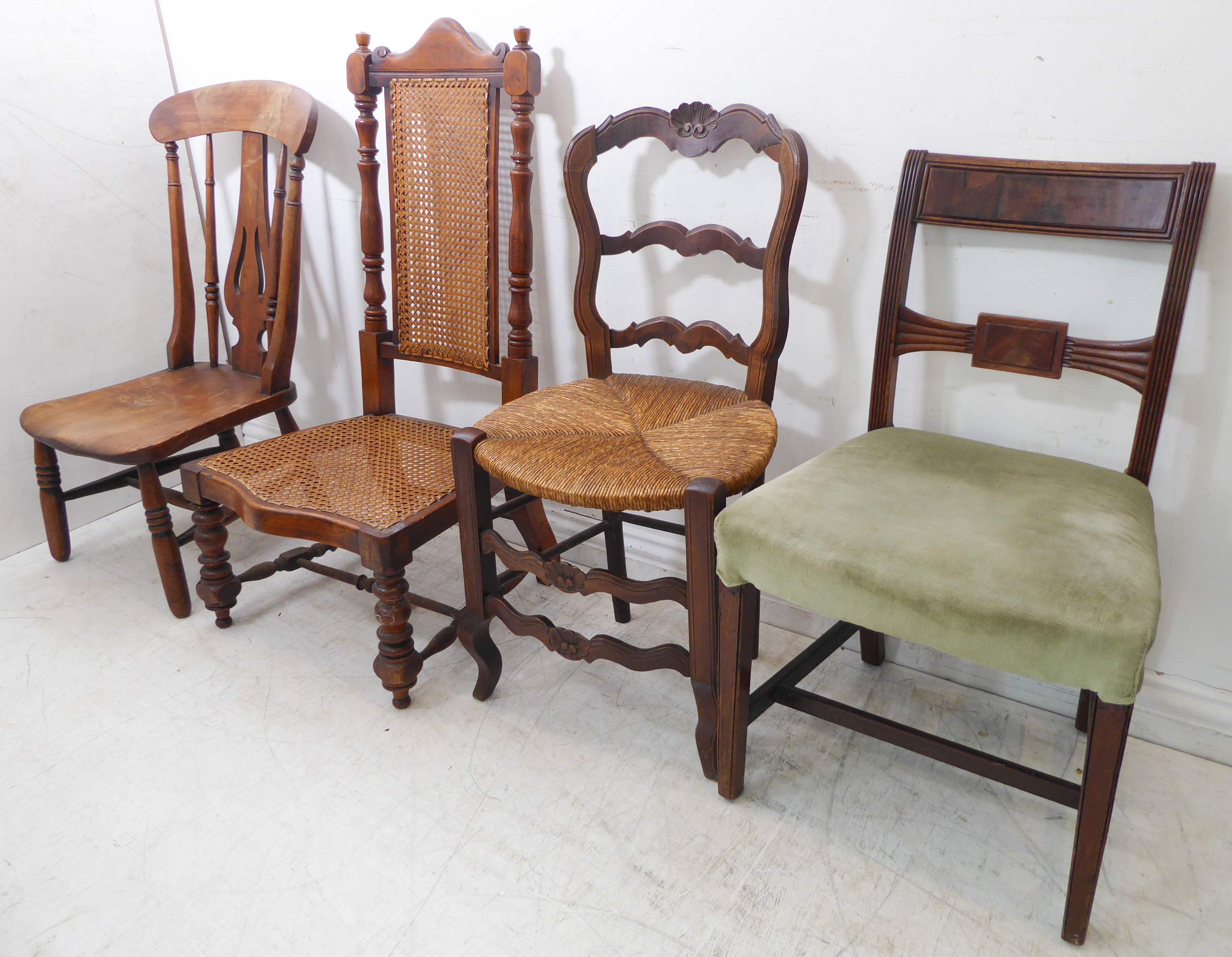 Four varying chairs comprising: an early 19th century Regency period mahogany example with tablet