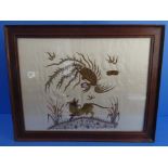 A oak framed and glazed early 20th century Chinese needlework depicting a fen representative of