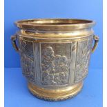 A heavy 19th century polished brass two-handled planter (probably Japanese) decorated in low