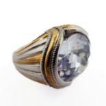 A heavy silver ring set with rock crystal, ring size L/M