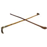 A leather-bound whalebone-type riding crop (80 cm) and a bamboo hunting crop with antler hook and
