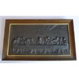 A framed cast-iron wall-mounting plaque depicting the Last Supper (frame size 21.5cm x 37cm)