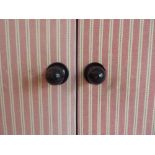 Two pairs of decorative hinged window shutters covered in pink striped material (pair 1 approx.