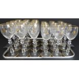 A set of 12 very fine large (21.5m high) and 12 small (20cm high) Baccarat wines with gilded rims,
