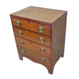 A four-drawer mahogany chest of small proportions and in Georgian style: the caddy top above