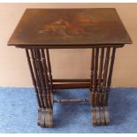 A nest of four late 19th to early 20th century lacquered quartetto tables: the largest decorated