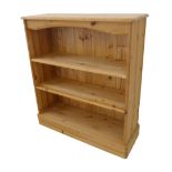 A modern open pine bookcase: shelves above plinth base (83cm wide x 29cm deep x 92cm high)