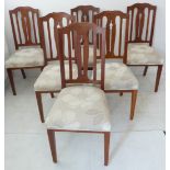 A set of six early 20th century oak and mahogany dining chairs: each with pierced splat and