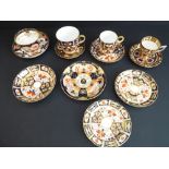A good selection of Royal Crown Derby ceramics hand-gilded and decorated in the Imari palette to