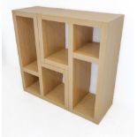 Two modern wood effect shelf-units (the largest 80cm wide x 57cm deep)