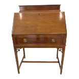 An Edwardian period mahogany and satinwood crossbanded writing bureau: the galleried top above a