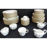 An 89-piece 12-place Spode 'Canterbury' dinner service: 13 x 27.5 cm; 12 x 23.5 cm, 12 x 20.5 and 12