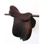 A 16" Charles Mountfort brown leather pony saddle