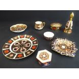 Eight small Royal Crown Derby pieces hand-gilded and decorated in the Imari palette:  a flowerhead-