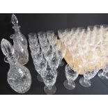 A set of 56 Royal Doulton cut-glass wines and 3 decanters: 18 x 13.5 cm, 19 x 12 cm (narrow brim)