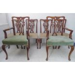 A good set of six (4+2) late 19th/early 20th century Chippendale-style walnut dining chairs: each