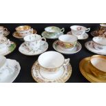 A selection of mostly late 19th to early 20th century decorative cups and saucers to include Royal