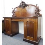 A large mid-19th century mahogany pedestal sideboard: single central drawer between the drawers